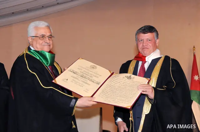 Palestinian President Mahmoud Abbas (Abu Mazen) during the granting of his Majesty King Abdullah II an honorary doctorate in Amman on Aug. 9, 2011. Photo by Thaer Ganaim
