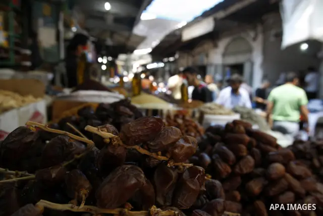 Palestinians shop for food at a market in Gaza city on Aug. 10, 2011. Muslims around the world abstain from eating, drinking and conducting sexual relations from sunrise to sunset during Ramadan, the holiest month in the...