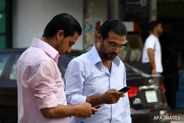Palestinians try to call each other through the Palestinian communication services (Jawwal) but there are problems in communication because of the damage of Israeli attacks, yesterday evening in Gaza city on Aug. 10, 201...