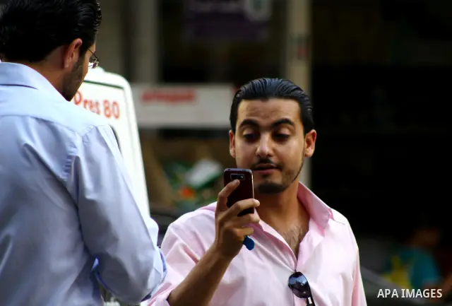 Palestinians try to call each other through the Palestinian communication services (Jawwal) but there are problems in communication because of the damage of Israeli attacks, yesterday evening in Gaza city on Aug. 10, 201...