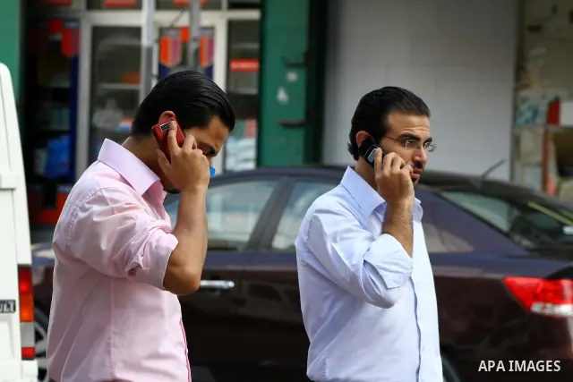 Palestinians try to call each other through the Palestinian communication services (Jawwal) but there are problems in communication because of the damage of Israeli attacks, yesterday evening in Gaza city on Aug. 10, 201...