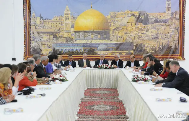 Palestinian president Mahmud Abbas meets with 25 visiting representatives from the US congress in the West Bank city of Ramallah on August 11, 2011. Photo by THAER GANAIM