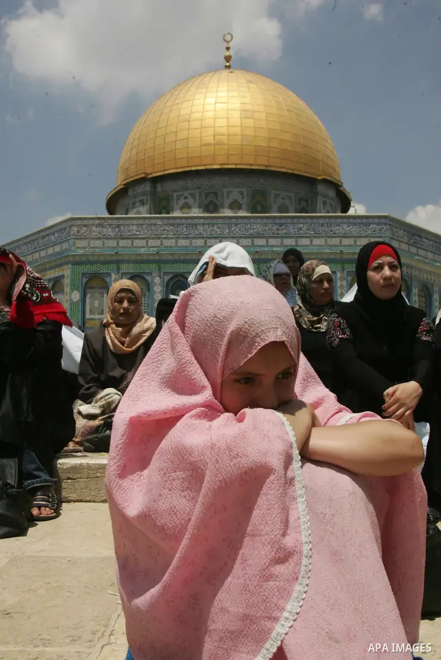 Palestinians gather for prayers at the Al Aqsa Mosque in Jerusalem, on the second Friday of the Muslim holy month of Ramadan, Friday Aug. 12, 2011. Muslims around the world are observing the holy fasting month of Ramadan...