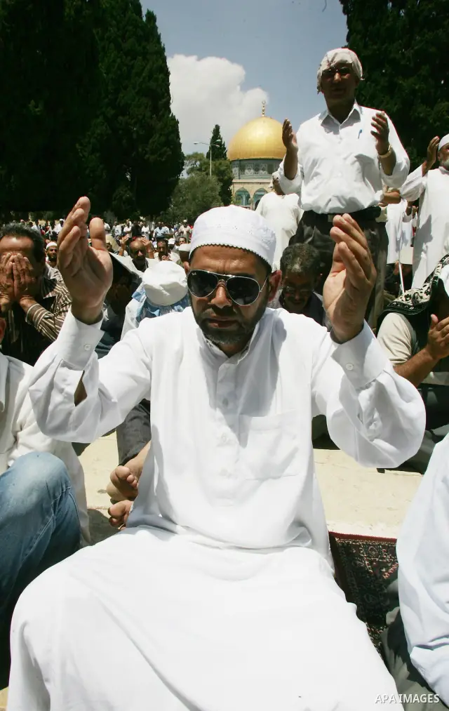 Palestinians gather for prayers at the Al Aqsa Mosque in Jerusalem, on the second Friday of the Muslim holy month of Ramadan, Friday Aug. 12, 2011. Muslims around the world are observing the holy fasting month of Ramadan...