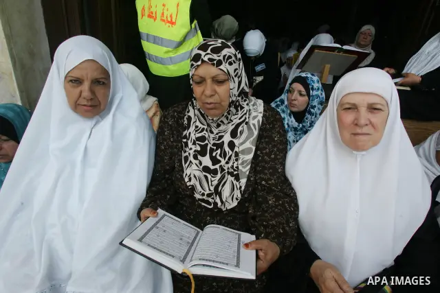 Palestinians gather for prayers at the Al Aqsa Mosque in Jerusalem, on the second Friday of the Muslim holy month of Ramadan, Friday Aug. 12, 2011. Muslims around the world are observing the holy fasting month of Ramadan...
