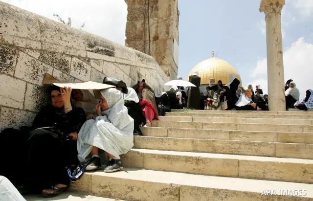 Palestinians gather for prayers at the Al Aqsa Mosque in Jerusalem, on the second Friday of the Muslim holy month of Ramadan, Friday Aug. 12, 2011. Muslims around the world are observing the holy fasting month of Ramadan...