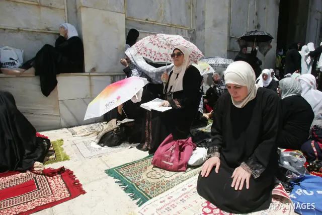 Palestinians gather for prayers at the Al Aqsa Mosque in Jerusalem, on the second Friday of the Muslim holy month of Ramadan, Friday Aug. 12, 2011. Muslims around the world are observing the holy fasting month of Ramadan...