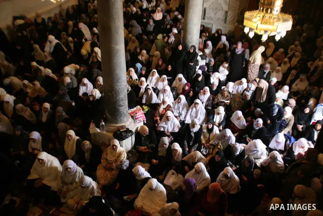 Palestinian Muslims pray in the Dome of the Rock on the compound known to Muslims as al-Haram al-Sharif and to Jews as Temple Mount during the second Friday of the holy month of Ramadan in Jerusalem's Old City on Aug. 12...