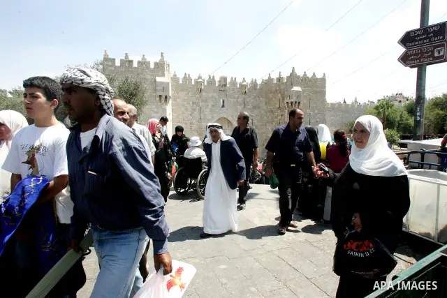 Palestinians gather for prayers at the Al Aqsa Mosque in Jerusalem, on the second Friday of the Muslim holy month of Ramadan, Friday Aug. 12, 2011. Muslims around the world are observing the holy fasting month of Ramadan...