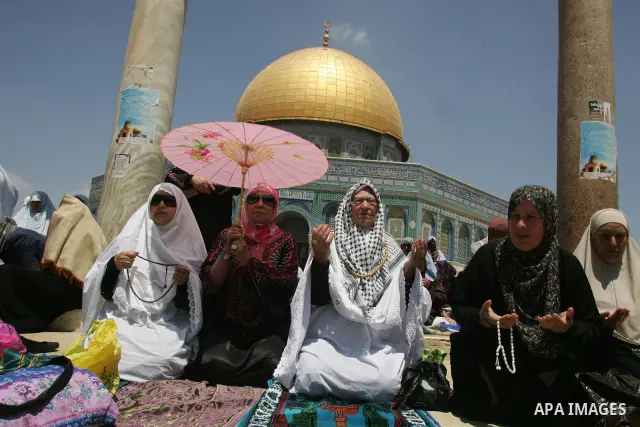 Palestinians gather for prayers at the Al Aqsa Mosque in Jerusalem, on the second Friday of the Muslim holy month of Ramadan, Friday Aug. 12, 2011. Muslims around the world are observing the holy fasting month of Ramadan...