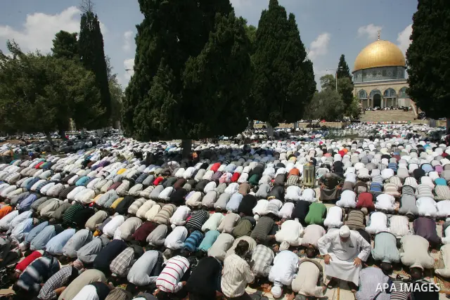 Palestinians pray at the Al Aqsa Mosque in Jerusalem, on the second Friday of the Muslim holy month of Ramadan, Friday Aug. 12, 2011. Muslims around the world are observing the holy fasting month of Ramadan where they re...