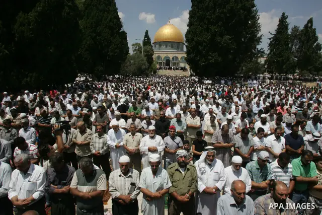 Palestinians pray at the Al Aqsa Mosque in Jerusalem, on the second Friday of the Muslim holy month of Ramadan, Friday Aug. 12, 2011. Muslims around the world are observing the holy fasting month of Ramadan where they re...