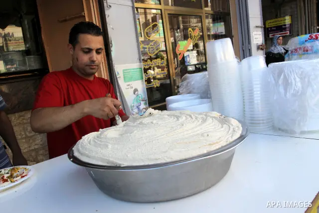 A Palestinian vendor sells chickpeas in his shop in Gaza City on Aug. 15, 2011. Muslims around the world abstain from eating, drinking and conducting sexual relations from sunrise to sunset during Ramadan, the holiest mo...