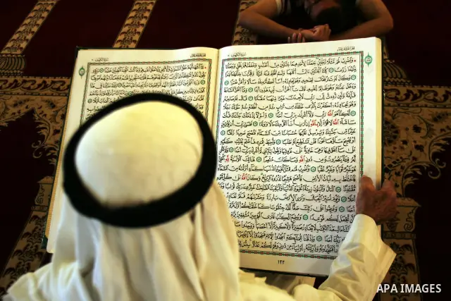 A Palestinian man reads the holy Koran in al-Aqsa Mosque, on the compound known to Muslims as al-Haram al-Sharif, in Jerusalem's Old City during the holy month of Ramadan August 14, 2011. Muslims around the world are obs...