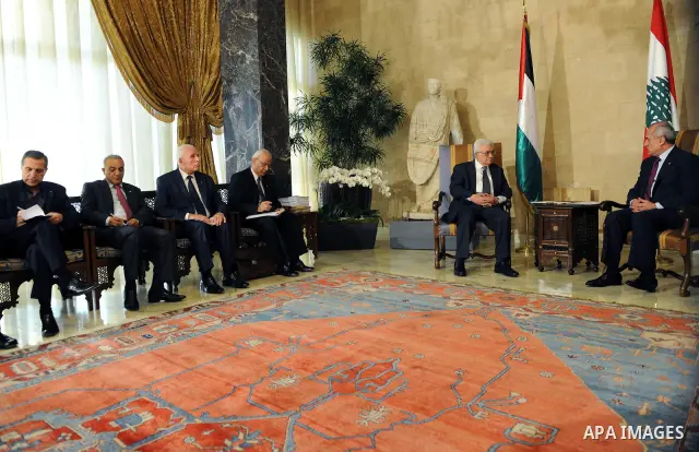 Palestinian President Mahmoud Abbas meets with Lebanon's President Michel Suleiman during an official welcoming ceremony upon Abbas' arrival at the Presidential Palace in Baabda, east of Beirut, August 16, 2011. Photo by...