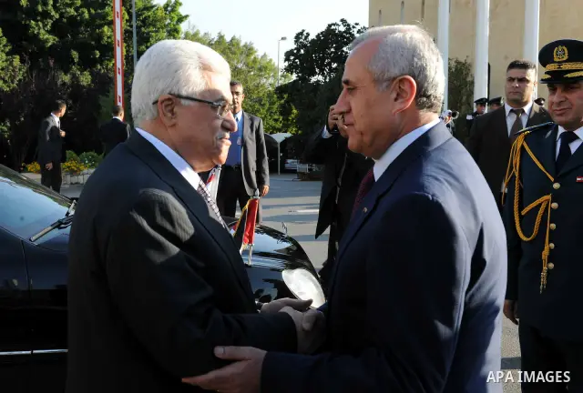 Palestinian President Mahmoud Abbas meets with Lebanon's President Michel Suleiman during an official welcoming ceremony upon Abbas' arrival at the Presidential Palace in Baabda, east of Beirut, August 16, 2011. Photo by...