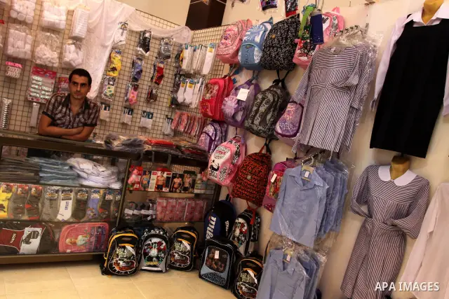 Palestinians participate in the opening of an exhibition of national products in Gaza city on Aug. 17, 2011 . Photo by Mohammed Asad