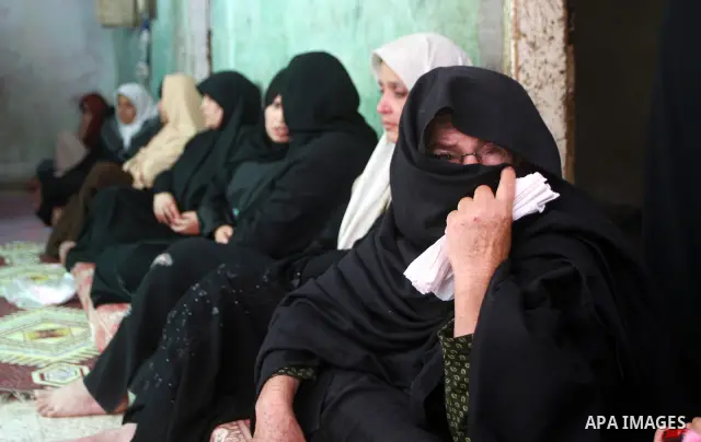 Palestinian women mourn during the funeral of Saed al Majdalawai in Nusseirat refugee camp in the central Gaza Strip on August 17, 2011. Israeli forces shot dead al Majdalawai near the border fence with Israel. An Israel...