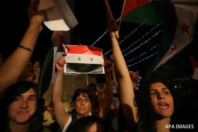 Dozens of Palestinians from Jerusalem protest in front of the Damascus Gate against the repression and massacres perpetrated by the Syrian regime against the Palestinian and Syrian people living in Syria, Jerusalem, on 1...