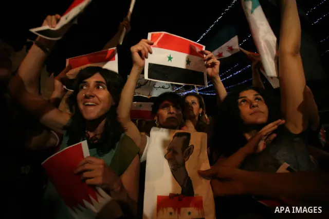 Dozens of Palestinians from Jerusalem protest in front of the Damascus Gate against the repression and massacres perpetrated by the Syrian regime against the Palestinian and Syrian people living in Syria, Jerusalem, on 1...