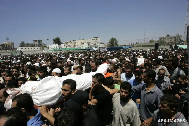 Palestinians attend the funeral of militant Kamal al-Nayrab, secretary-general of the Gaza-based group the Popular Resistance Committees (PRC) and five other people including a baby, killed in Israeli air strikes in the...