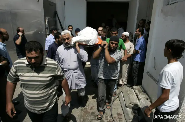 Palestinians attend the funeral of militant Kamal al-Nayrab, secretary-general of the Gaza-based group the Popular Resistance Committees (PRC) and five other people including a baby, killed in Israeli air strikes in the...