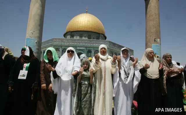 Palestinians gather for prayers at the Al Aqsa Mosque in Jerusalem, on the third Friday of the Muslim holy month of Ramadan, August 19, 2011. Muslims around the world are observing the holy fasting month of Ramadan where...
