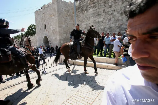 Muslim worshippers run away from Israeli mounted policemen after trying to cross a police barrier near Damascus Gate in Jerusalem's Old City during the third Friday of the holy month of Ramadan August 19, 2011. Israeli s...