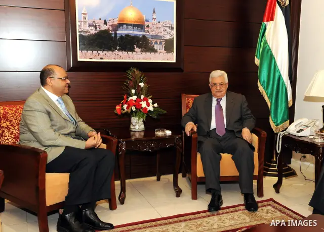 Palestinian President Mahmoud Abbas (Abu Mazen) meets with the Egyptian Ambassador Yasser Othman, in the West bank city of Ramallah on August 20, 2011. Photo by Mufeed Abu Hasnah