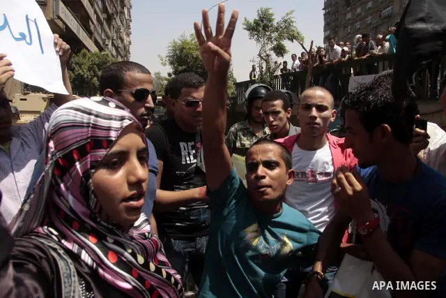 Egyptian protesters shout slogans against Israel during a protest in front of the Israeli Embassy in Cairo, on August 21, 2011. Egypt and Israel sought on Sunday to defuse a diplomatic crisis over the killing of five Egy...