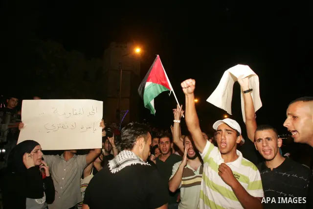 Protesters from several anti-war and pro-Palestinian groups gather at Damascus Gate of the Old City of Jerusalem on Aug. 21, 2011, to protest the disproportionate use of force by the Israeli armed forces during air-strik...