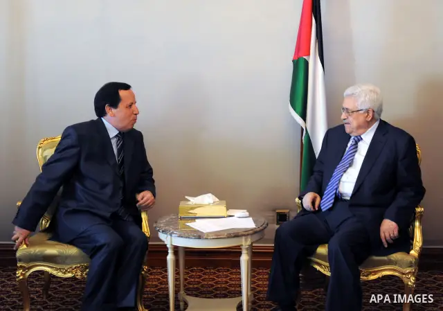 Palestinian President Mahmoud Abbas (Abu Mazen) meets with the Tunisian writer of Secretary of State and Minister of Foreign Affairs, khamees Aljhenawi in Doha on Aug. 23, 2011. Photo by Thaer Ganaim