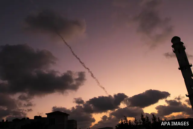 A rocket is launched by Palestinian militants from the Gaza Strip toward Israel, in Gaza city on August 24,2011. Israeli air strikes killed a local commander of the Islamic Jihad militant group in the Gaza Strip and woun...
