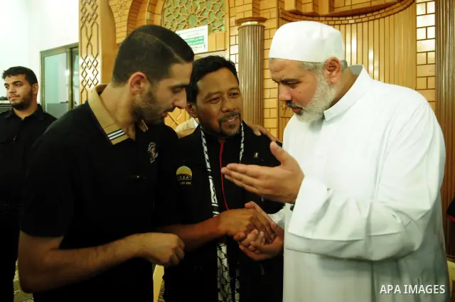 Palestinian Prime Minister in Gaza Strip, Ismail Haniya meets with a Malaysian delegation at mosque in Gaza city on August 24,2011. Photo by Ahmad Shaat
