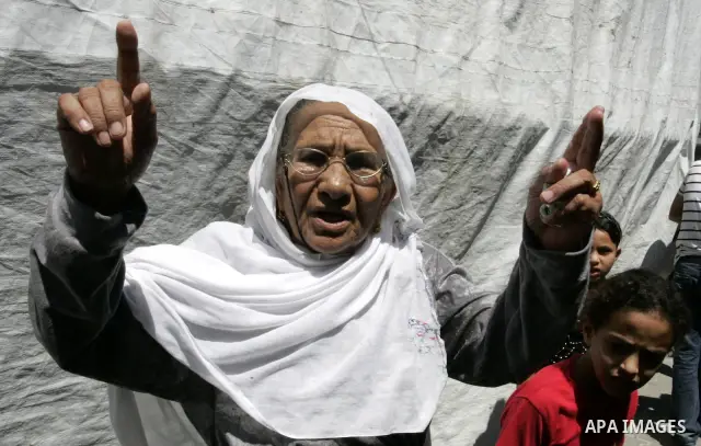 A relative of Palestinian Hisham Abu Harb mourns during his funeral in Rafah in the southern Gaza Strip on August 25, 2011. A days-old truce announced by Gaza militants appeared to be fast unravelling after 24 hours of a...