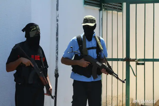 Palestinian militants of Islamic Jihad militant take part in the funeral of Atteya Mqat, in Gaza City on Aug. 25, 201. Mqat was killed early Wednesday in Israeli airstrike in Gaza. Photo by Ashraf Amra