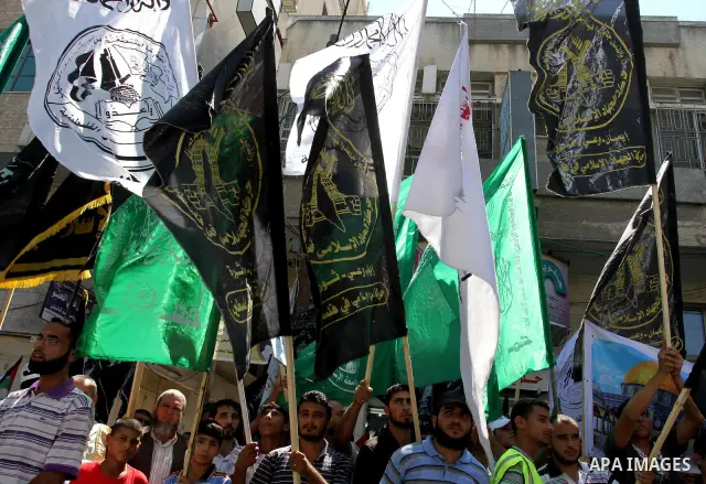 Palestinians take part in a protest as they mark Quds Day or Jerusalem Day in Gaza city, Friday, Aug. 26, 2011. The late Iranian leader Ayatollah Khomeni declared the last Friday of the Islamic fasting month of Ramadan a...