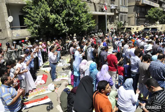 Egyptian protesters shout slogans against Israel during a protest in front of the Israeli Embassy in Cairo, Egypt, Friday, Aug.26, 2011. Hundreds of Egyptians protest the deaths of Egyptian security forces killed in a sh...