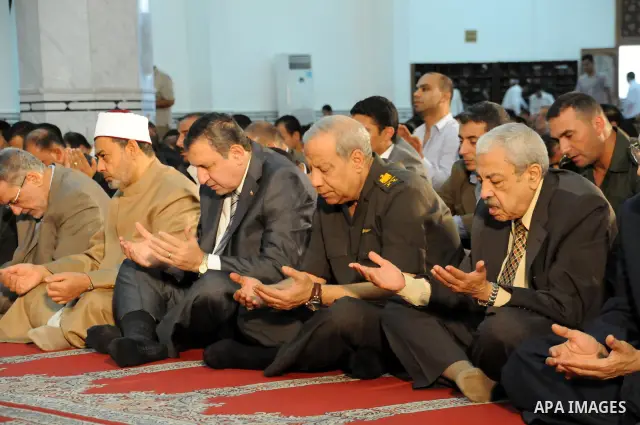 Egyptian Prime Minister, Essam Sharaf attends the last Friday prayers of the holy month Ramadan at a mosque in Cairo on August 26,2011. Egyptian security has been boosted around the Israeli embassy ahead of a protest whi...