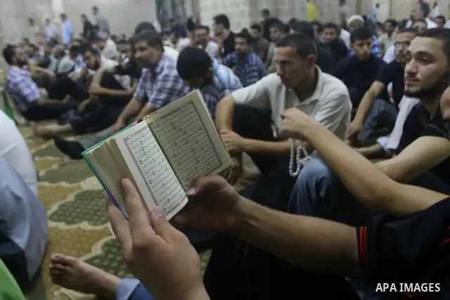 Palestinian Muslim worshippers pray during Laylat Al Qadr prayers on the 27th day of the holy fasting month of Ramadan in main mosque of Al Emari in Gaza City, Friday, Aug. 27, 2011. Laylat Al Qadr, the most important pr...
