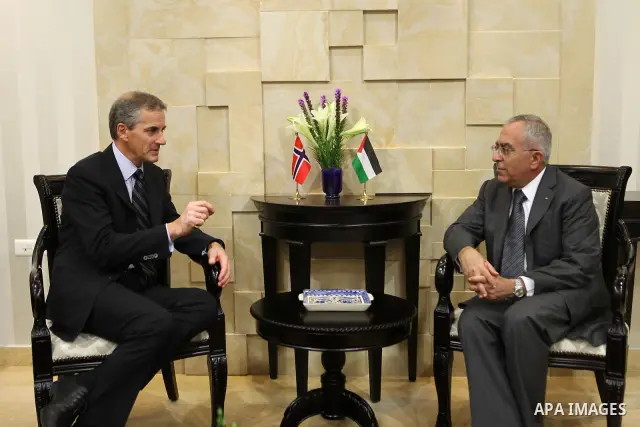Palestinian Prime Minister Salam Fayyad, meets with Norwegian Foreign Minister Jonas Gahr Stoere in the West Bank city of Ramallah on August 27, 2011. Photo by Mustafa Abu Dayeh