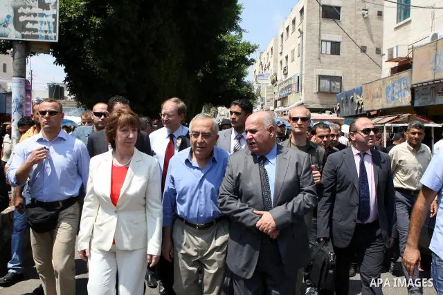 Palestinian Prime Minister, Salam Fayyad and Foreign Affairs Commissioner in the European Union Catherine Ashton, during a tour of the Jenin market, in the West Bank city of Jenin on Aug. 28, 2011. Photo by Mustafa Abu D...