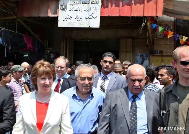Palestinian Prime Minister, Salam Fayyad and Foreign Affairs Commissioner in the European Union Catherine Ashton, during a tour of the Jenin market, in the West Bank city of Jenin on Aug. 28, 2011. Photo by Mustafa Abu D...