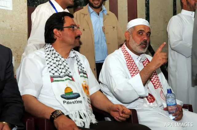 Palestinian Prime Minister, Ismail Haniya receives Turkey delegation in Gaza city on Aug. 29, 2011. calling them to continue to support the Palestinian people. Photo by Ahmed Shaat