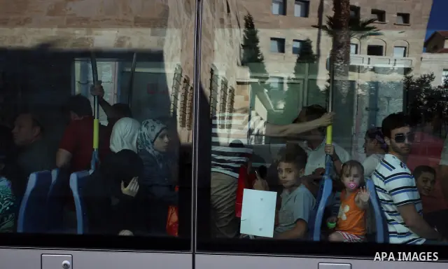 Palestinian and israeli Passengers ride a light rail train, Ten days after opened to the public in Jerusalem, on Aug. 29, 2011. The Jerusalem municipality said that a long-awaited light rail system is beginning operation...