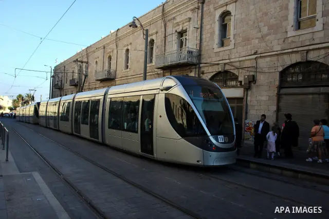 Palestinian and israeli Passengers ride a light rail train, Ten days after opened to the public in Jerusalem, on Aug. 29, 2011. The Jerusalem municipality said that a long-awaited light rail system is beginning operation...