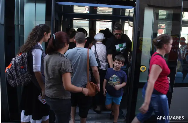 Palestinian and israeli Passengers ride a light rail train, Ten days after opened to the public in Jerusalem, on Aug. 29, 2011. The Jerusalem municipality said that a long-awaited light rail system is beginning operation...