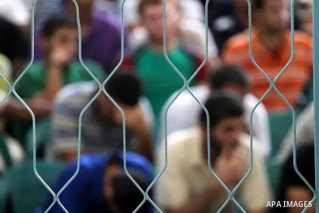 Palestinian prisoners prepare to be freed from a Hamas-run jail in Gaza City on Aug. 29, 2011. Palestinian Hamas police released prisoners because of the approaching Eid al-Fitr. Photo by Mohammed Asad