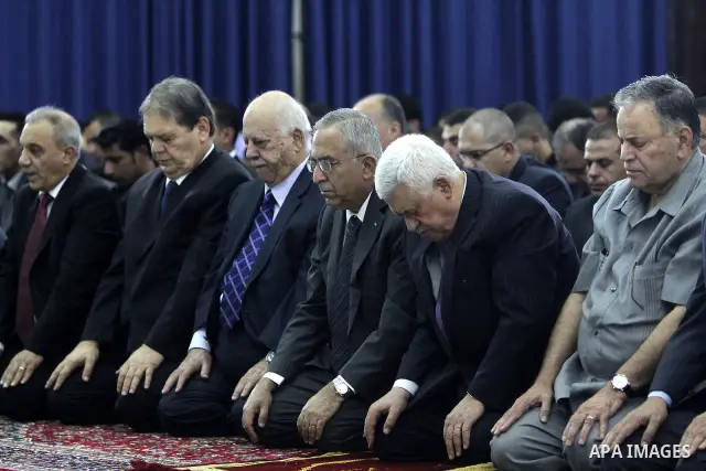 Palestinian president Mahmoud Abbas (Abu Mazen) attends the prayer of Eid al-Fitr in the West Bank city of Ramallah August 30, 2011. Eid al-Fitr marks the end of the Muslim holy month of Ramadan. Photo by Issam Rimawi