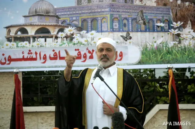Ismail Haniya, Palestinian Prime Minister in the Gaza Strip, addresses the public during an open air morning prayer to celebrate Eid al-Fitr in Khan Yunis town the southern Gaza Strip on August 30, 2011. The Palestinian...